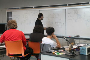 Instructor at whiteboard